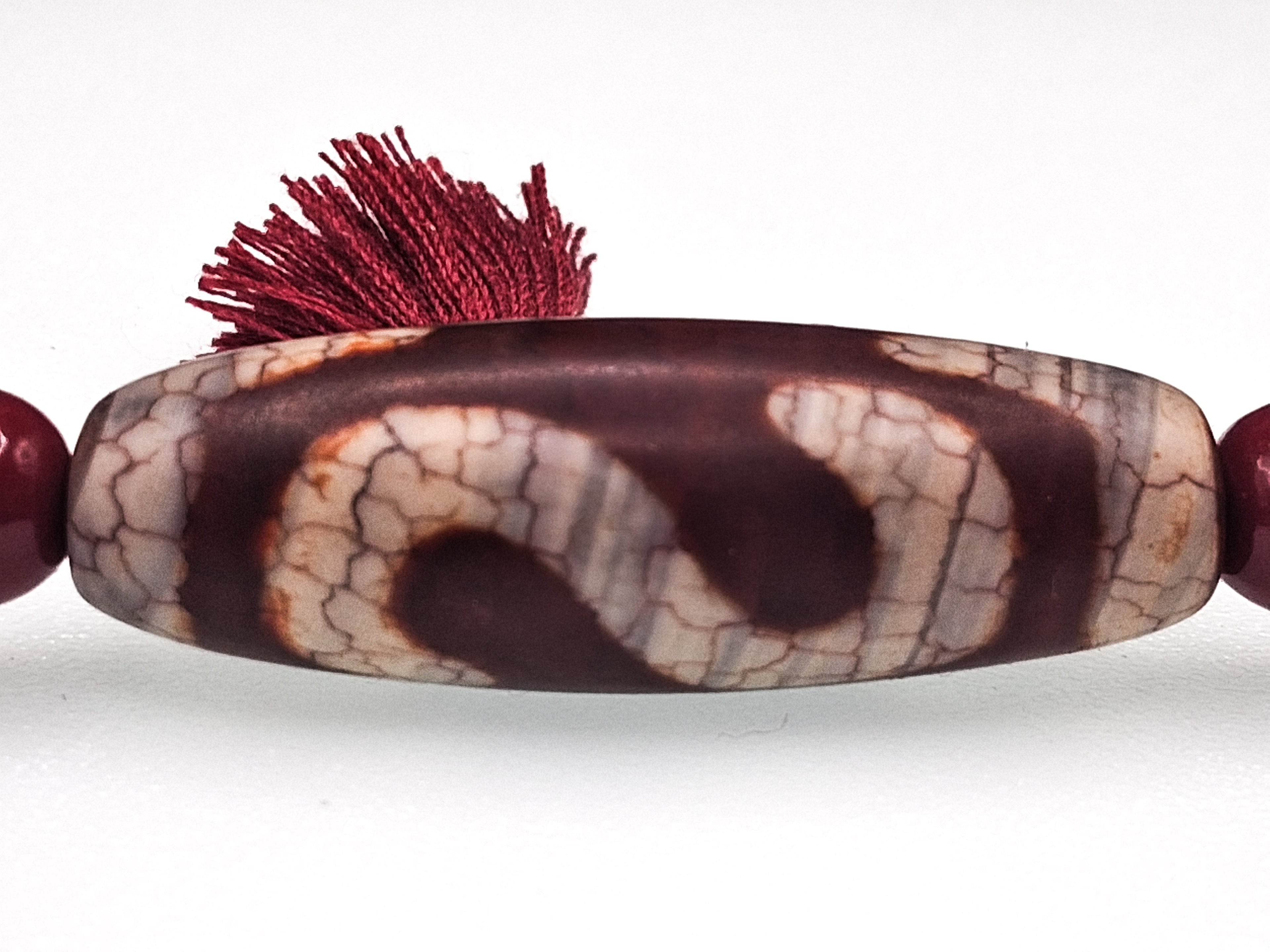 Natural Features of Dzi Beads