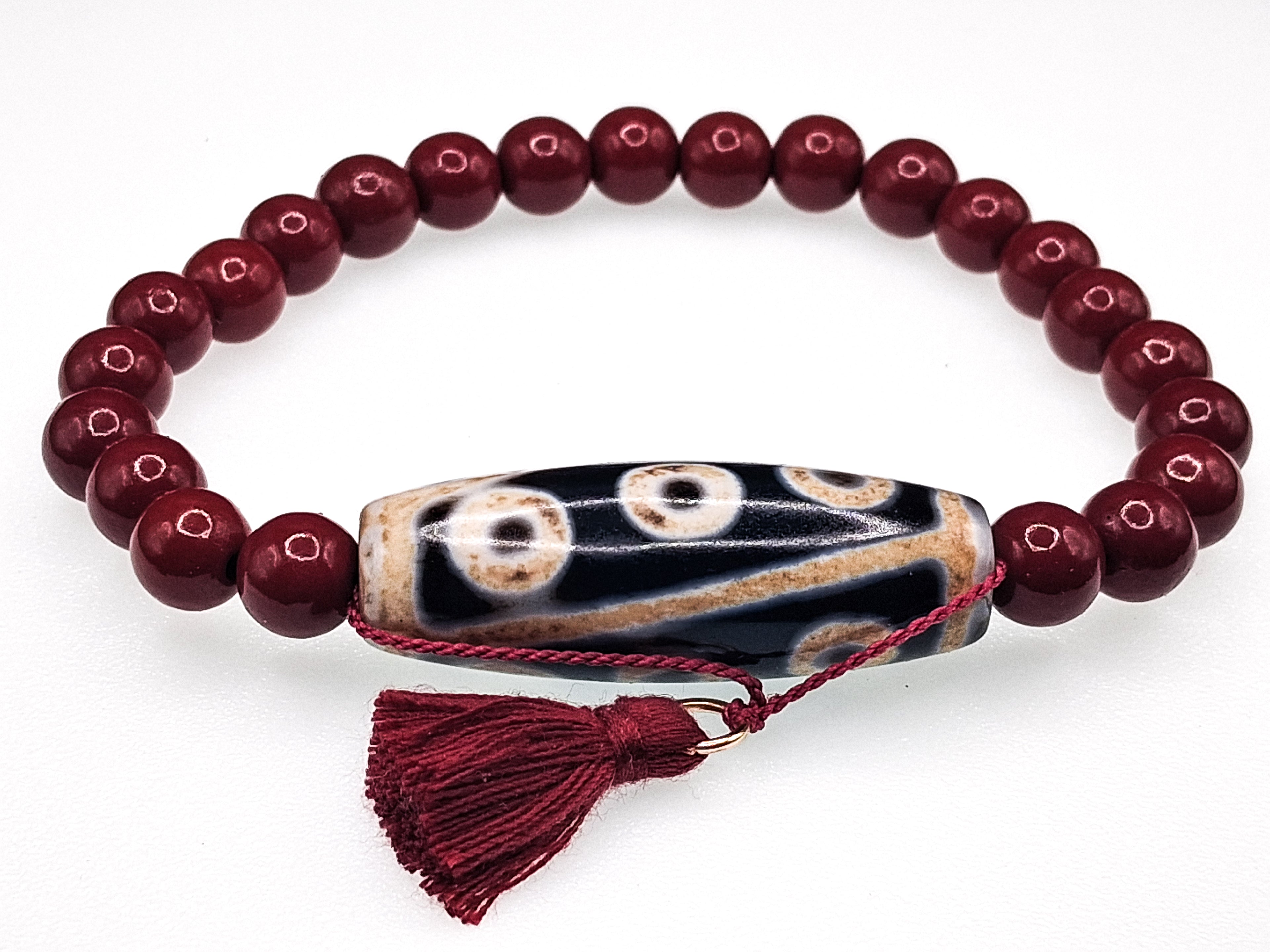9-Eye Dzi with Da Luo Design — Cinnabar Bracelet