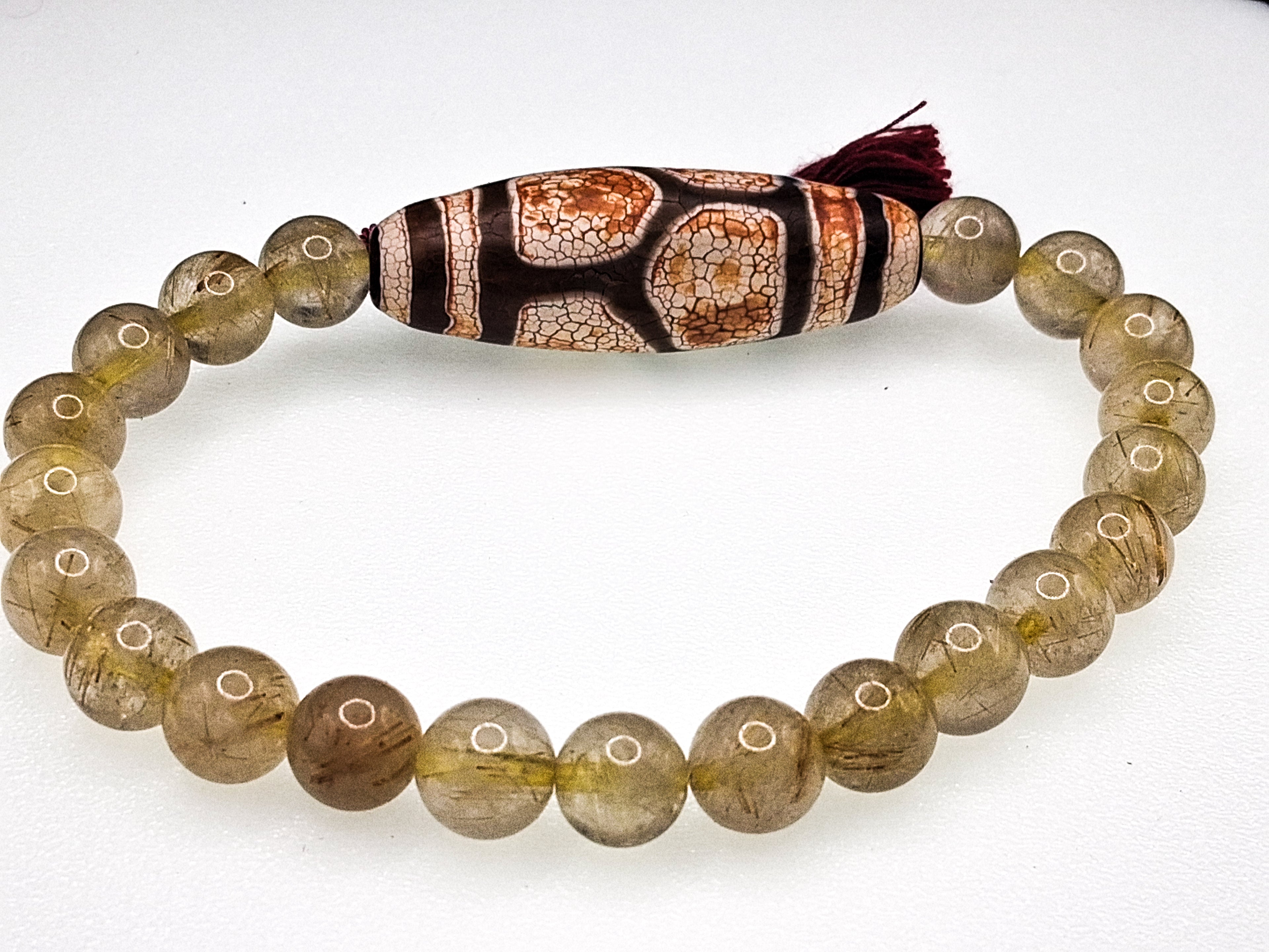 Tortoiseshell Dzi with Two Stripes — Bracelet with Gold Rutilated Quartz