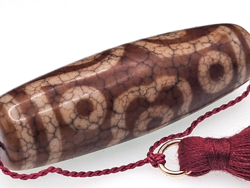 11-Eye Dzi — Buddha Eyes with Dragon Veins and Four-Petal Lotus