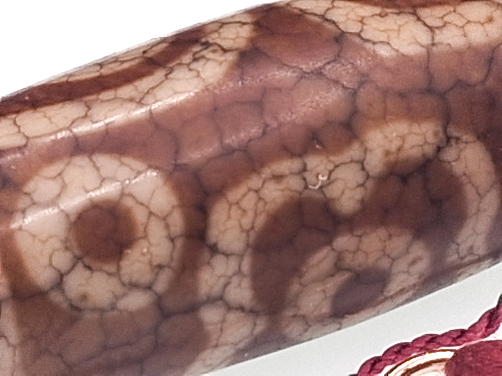 11-Eye Dzi — Buddha Eyes with Dragon Veins and Four-Petal Lotus