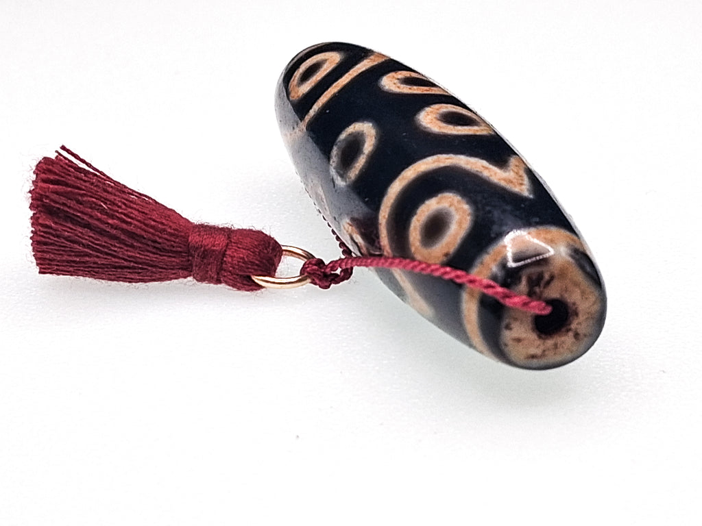 15-Eyed Tian Zhu (Dzi) Bead — The Stone of Enlightened Accomplishment