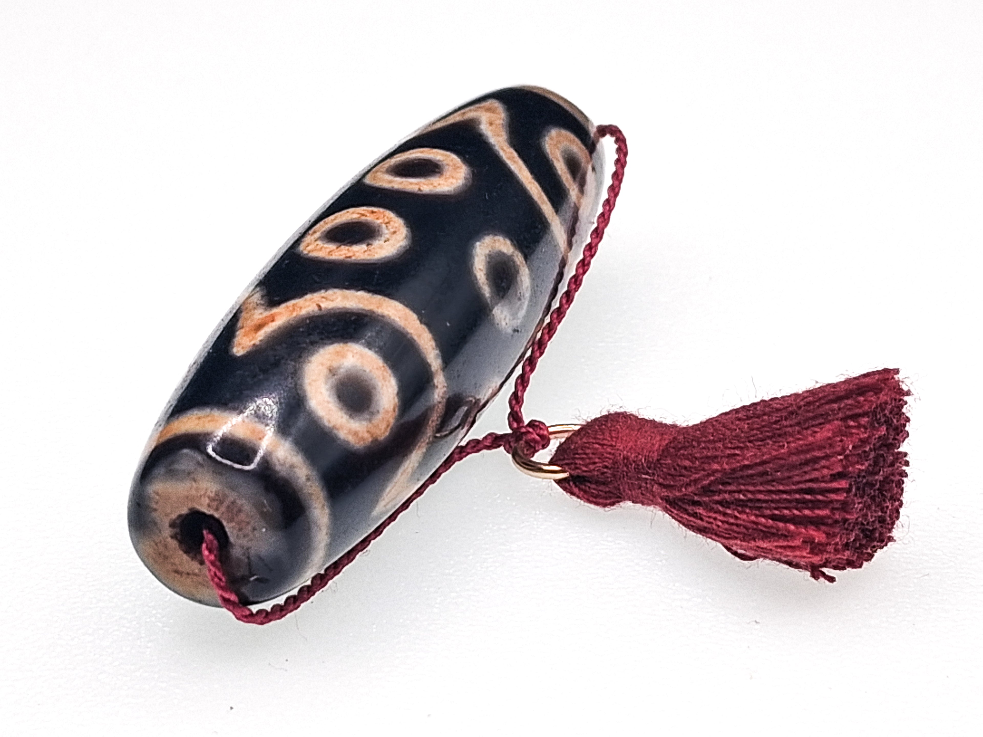 15-Eyed Tian Zhu (Dzi) Bead — The Stone of Enlightened Accomplishment