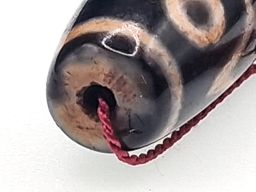 15-Eyed Tian Zhu (Dzi) Bead — The Stone of Enlightened Accomplishment