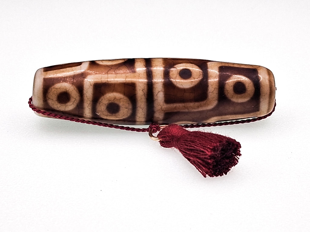 12-Eyed Buddha Dzi with Six Lightnings — The Stone of Power and Recognition