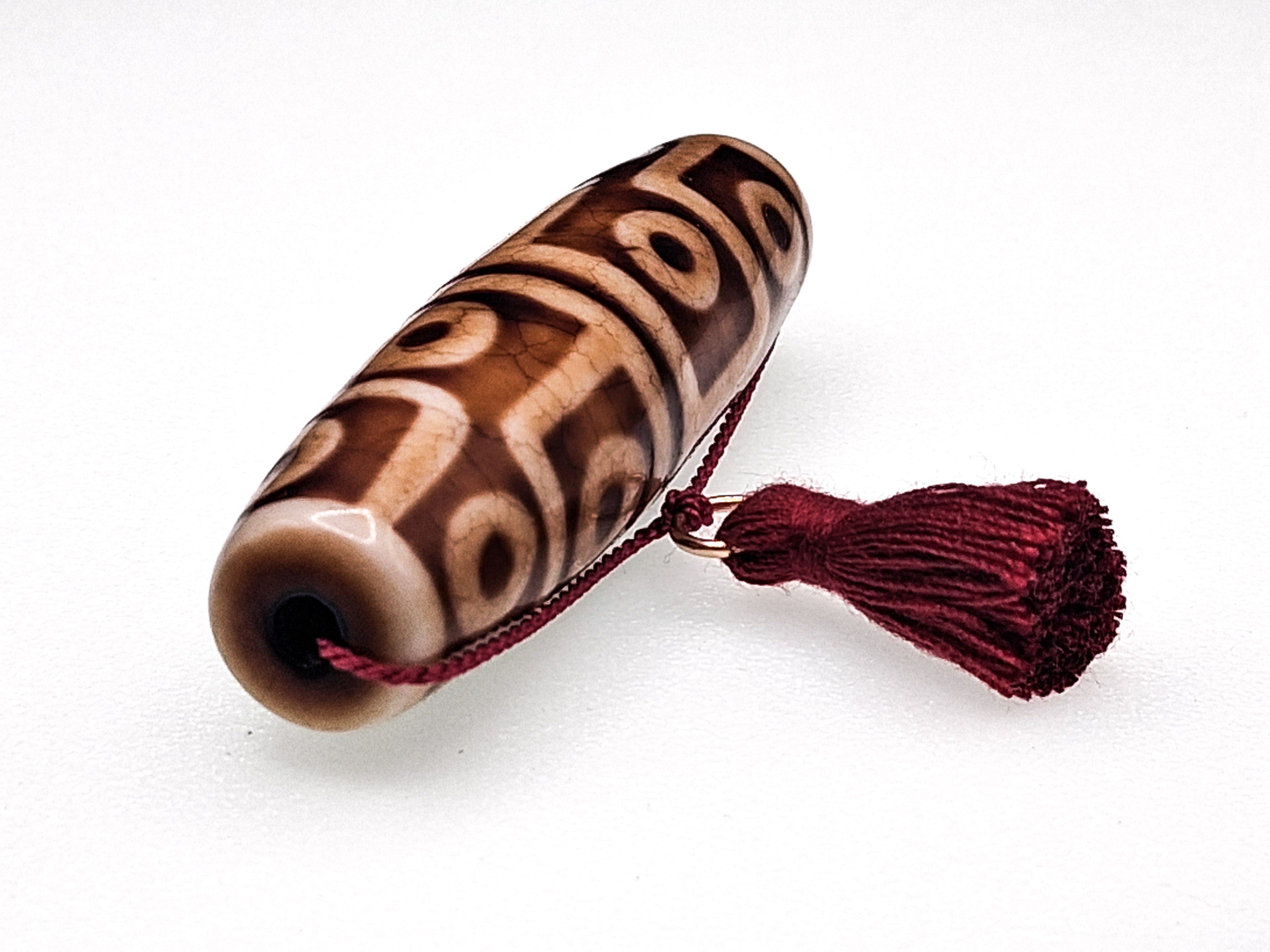 12-Eyed Buddha Dzi with Six Lightnings — The Stone of Power and Recognition