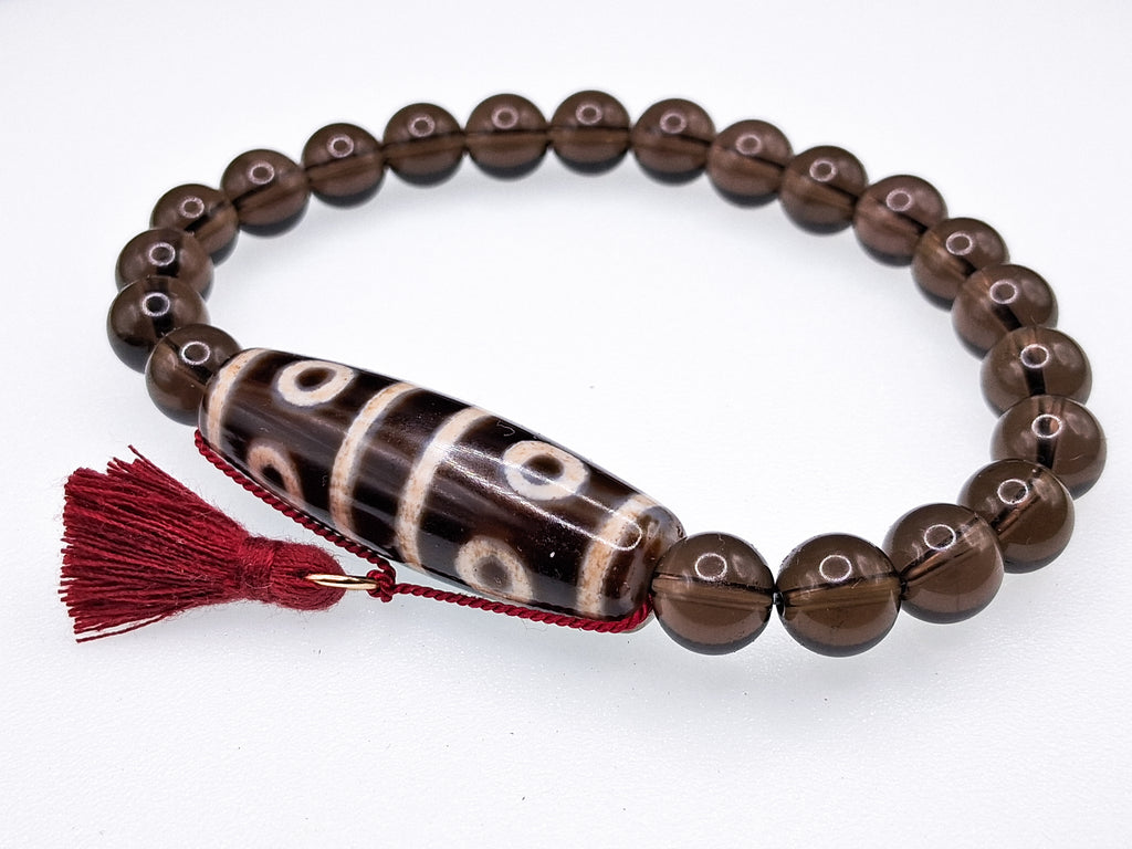 40 mm Dzi Bead — 8-Eyed • 4 Stripes Bracelet: 8" Smoky Quartz