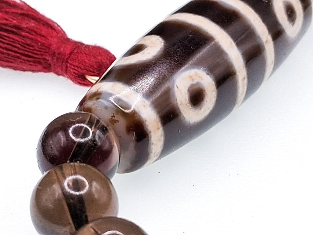 40 mm Dzi Bead — 8-Eyed • 4 Stripes Bracelet: 8" Smoky Quartz
