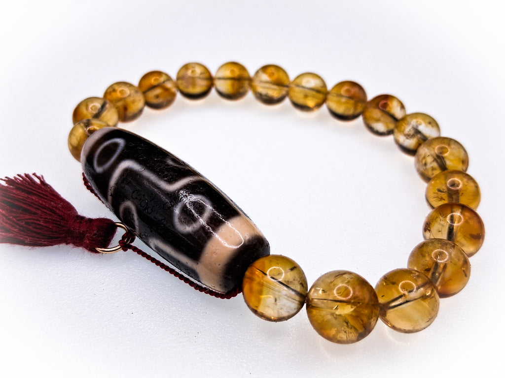 Dzi Bead — 9 Phoenix Eyes • 3 Lightning • 2 Stripes Bracelet: 8" Citrine